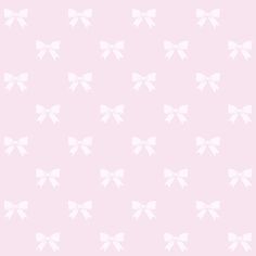 a pink background with white bows on it