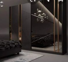 a black and gold bedroom with mirrored closet doors