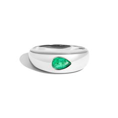 The Bombe Dome Ring with Pear Emerald transforms the classic bombe ring into a modern statement piece. This band features a natural pear shaped emerald burnish set at the center of a domed ring. The perfect addition to any stack seeking a bold addition. Classic Green Teardrop Emerald Ring, Teardrop Emerald Ring For Formal Occasions, Teardrop Emerald Ring Fine Jewelry, Teardrop Emerald Promise Ring In Fine Jewelry Style, Teardrop Emerald Ring In Fine Jewelry Style, Fine Jewelry Emerald Teardrop Ring, Emerald Teardrop Ring Fine Jewelry, Classic Teardrop Emerald Ring For Formal Occasions, Classic Pear-shaped Emerald Ring