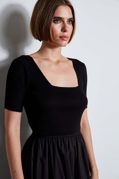 Effortlessly cool, our Poplin Dress has a sweater knit bodice with a chic square neckline. The short sleeves, midi hem & full skirt lend an ultra-femme vibe. Short Puff Sleeve Knit Bodice Poplin Midi Dress Runs true to size. Model is 5'10" and wearing size S Dry Clean Only Imported Style #: THF46008 Square Neck Midi Dress, Short Puff Sleeve, Jumpsuit Jacket, Special Dresses, Poplin Dress, Long Sleeve Short Dress, Knit Tees, Denim Coat, Sweater Knit