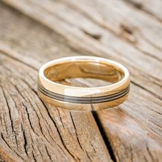 a wooden table with a ring on it