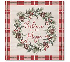 believe in the magic christmas card with holly and pine cones on red checkered paper