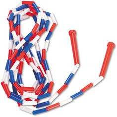 several red, white and blue toothpicks on a white background