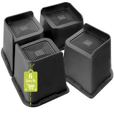 four black square foot stools with price tag