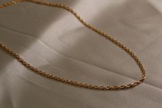 14k gold filled rope chain unisex gold chain available in different lengths Adjustable Figaro Chain Link Jewelry, Dainty Cuban Link Jewelry With Adjustable Chain, Classic Rope Chain Link Necklace, Classic Link Chain Necklace With Rope Detail, Gift Twisted Rope Chain Necklace, Classic Link-style Rope Chain Necklace, 14k Gold Rope Chain Jewelry As Gift, Rose Gold Plated Figaro Chain Jewelry, Rose Gold Figaro Chain Jewelry In Gold Plated