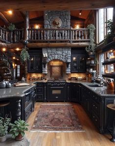 a large kitchen with black cabinets and wood flooring is decorated in rustic style, while an area rug has been placed on the hardwood floor