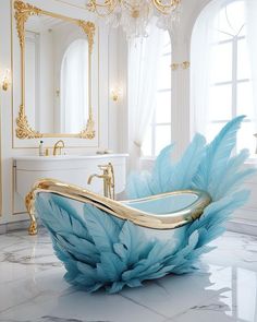 a bathtub with blue feathers on it in a white and gold colored bathroom area