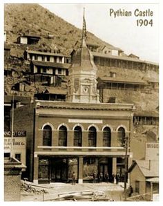 an old building with a steeple in the background