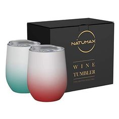 two wine glasses sitting next to each other in front of a box with the packaging on it