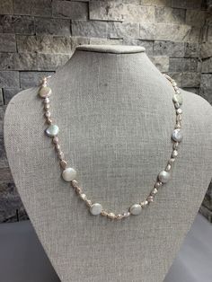 White Coin Pearls and Pink Keshi Necklace. This hand knotted necklace features 12 White Freshwater Coin Pearls AAA High Luster 12-13mm rainbow overtones with 52 pink Freshwater Keshi Pearls AAA High Luster 5.5-7.5mm average size finished with a 925 silver heart toggle clasp. The pearls are Genuine and natural in color. I hand knotted this necklace with pink silk thread. The necklace measures 23 1/2 inches in length. The necklace pictured is the one you will receive. Please visit our shop for mor Pearl White Necklace With Gemstone Beads, Pearl White Necklaces With Gemstone Beads, Adjustable Round Pearl Necklace With Gemstone Beads, Adjustable Pearl Necklace With Gemstone Beads, White Hand-strung Round Necklaces, Handmade Adjustable Round Pearl Necklace, Handmade Adjustable Pearl Necklace, Adjustable Round Pearl Beaded Necklaces, Hand Knotted Necklace