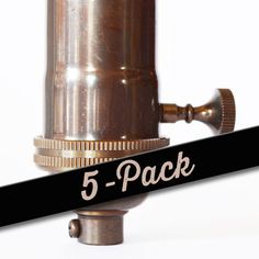 an old fashioned telescope with the number 5 - pack on it's back side