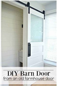 the diy barn door from an old farmhouse door is easy to make and looks great in any room