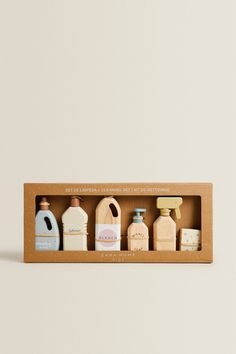 an assortment of handmade soaps in a wooden box