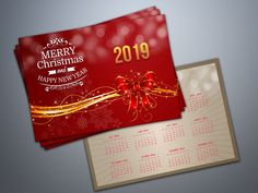 two christmas greeting cards with red and gold ribbons on them, one is for the new year