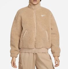 Beige Sporty Track Jacket For Fall, Beige Winter Track Jacket For Streetwear, Winter Beige Track Jacket For Streetwear, Beige Track Jacket For Winter Streetwear, Casual Beige Track Jacket For Fall, Sporty Cream Outerwear For Outdoor, Casual Beige Fleece Jacket With Fleece Lining, Casual Beige Fleece Outerwear, Casual Cream Long Sleeve Track Jacket