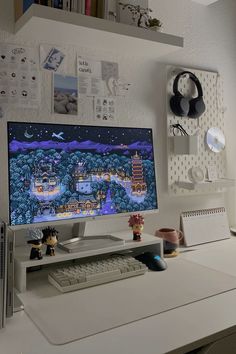 a desktop computer sitting on top of a white desk