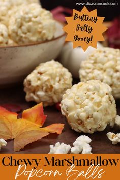 an image of popcorn balls on a table with fall leaves and pumpkins in the background