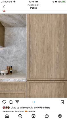 an instagramted photo of a bathroom with wooden cabinets