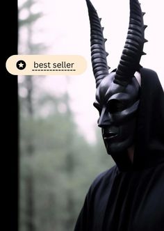 a man in a black mask with horns on his head and the words best seller above it