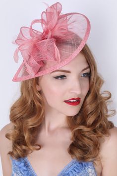 Timeless glamour. This sassy fascinator gives a nod to vintage style with a bouncy mesh ribbon and flighty feathers. With its classic sinamay mesh shape and elegant look it will be your go-to fascinator for the season. - Light weight - Attached to headband for easy wear - Comes in 18 bold colors Tea Hats, Hexagon Sunglasses, Blonde Bob Wig, Pink Fascinator, Timeless Glamour, Hat Fascinator, Fascinator Hairstyles, Dance Hairstyles, Party Hair