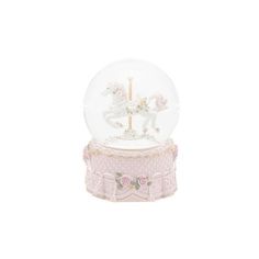 a snow globe with a horse on it and pink flowers in the bottom, sitting on top of a stand