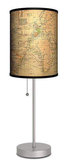 a table lamp with a map on it and a black shade over the top that is attached to a metal base