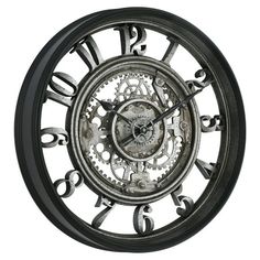 a large metal clock with gears on it's face and numbers in the middle