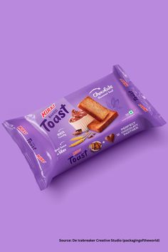 a bag of toast sitting on top of a purple surface