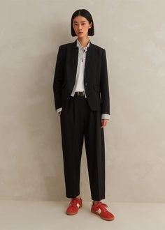 A smart tapered pant is joined by a more relaxed collarless blazer in ME+EM's Black Textured Tailoring Tapered Pant Suit, resulting in a comfortable two-piece that can be worn all day to the office and out of hours. Shop now. Black Pant Suit Women, Pant Suit Women, Modern Workwear, Black Pant Suit, Collarless Blazer, Fashion Me, Ankle Sleeve, Womenswear Fashion, Suit Women