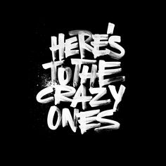 there's to the crazy ones written in white spray paint on a black background