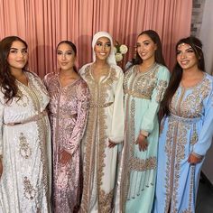 the brides are posing for a photo together