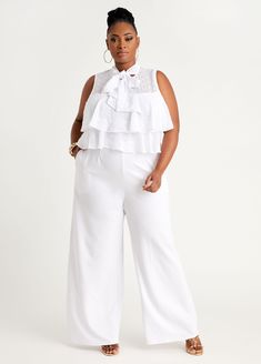 Elegant Spring Jumpsuits And Rompers With Ruffles, Sleeveless Ruffled Jumpsuits For Formal Occasions, Formal Sleeveless Ruffled Jumpsuits And Rompers, Summer Workwear Jumpsuits And Rompers With Ruffles, Formal Sleeveless Ruffled Jumpsuit, Chic Spring Jumpsuits And Rompers With Ruffle Hem, Spring Workwear Jumpsuits With Wide-leg Pants, Chic Spring Jumpsuit With Ruffle Hem, Sleeveless Jumpsuits And Rompers With Ruffle Hem For Spring