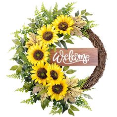 a wreath with sunflowers and greenery is the centerpiece for this welcome sign