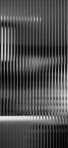 black and white photograph of vertical blinds