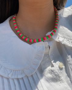 This necklace is the perfect accessory for any summer outfit! Dress the pearls up for a classier look, or wear it with your favorite pair of jeans for an instant pop of color. The pearls on this necklace provide an elegant touch to every outfit! This necklace is made out of red, pink, and green round heishi beads. Necklace Length: 14.5 inches - We add a 2in extender chain at the end to make the necklace adjustable (14.5 inches - 16.5 inches) - If you would like a different length, feel free to s Heishi Beads Necklace, Summer Outfit Dress, Heishi Jewelry, Staple Necklace, Jewelry Polymer Clay, Necklace Extender, Summer Necklace, Outfit Dress, Heishi Beads