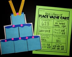 two pieces of paper that have been cut out to look like a place value cake