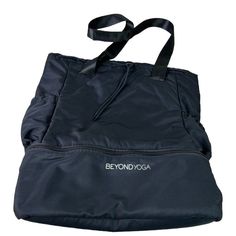 a black bag with the words beyond yoga printed on it's front and bottom