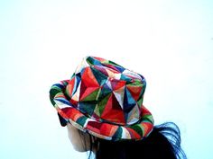 This Geometric Bucket hat is perfect for Festivals. This solid Bucket hat features a Jamaican Rasta Inspired , Red green yellow color bucket hat. Rock this hat as you dance the night away at your next outdoor concert or event. Fashionable and a must-have . This Hat is unisex that looks great on both men and women . This Hat is very durable and can be used as a special gift . -One Size Fits Most -Perfect for Festivals Color : Red green yellow Color : Rasta Bucket Hat / Reggae Hat / Jamaican Hat C Hippie Hat, Hipster Hat, Festival Hat, Boho Hat, Outdoor Concert, Red Green Yellow, Sun Hats, Bucket Hat, Special Gifts