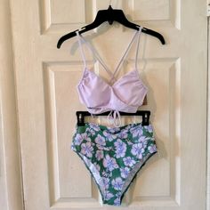 Pink Victoria’s Secret Body Wrap Bikini Top Color Purple Whisper Size Medium (36 A/B) & V Crossover High Waisted Bikini Bottom Color Forest Pine Hibiscus Size Medium (Fits Us Size 8 To 10). Body Wrap Bikini Top: The Takeaway: Comfy And Cute, All Wrapped In One. Crossover Detail In Front Is Finished With An Adjustable Tie In Back For The Perfect Fit. Lightly Lined. Wireless. Removable Padding Cross Front Detailing Adjustable Shoulder Straps And Center Back Tie Partially Made With Recycled Materia Fitted Purple Swimwear For Vacation, Purple Beachy Swimwear For Spring, Purple Tie-side Bottom Swimwear For Beachwear, Purple Tie-side Swimwear Bottom For Spring, Purple Swimwear For Spring Poolside, Fitted Purple Swimwear For Poolside, Purple Tie-side Bottom Swimwear For Spring, Purple Beachwear Swimwear For Poolside, Purple Swimwear For Spring