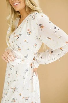 Hillary Ivory Floral Wrap Dress - DM Exclusive - Pre Order - Ships Nov. 22nd Quality online women’s modest clothing & accessories boutique. Everything you need at unbeatable prices. Modest dresses Modest bridesmaid dresses, modest missionary dresses, mother of the bride dresses Modest swim designs. One pieces, tankinis, midkinis, and more! Dm Design, Modest Bridesmaid Dresses, Floral Wrap Dress, Relaxing Yoga, Swimsuit Design, Nursing Friendly, Ivory Dresses, Floral Jacket, Nursing Clothes