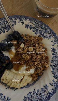 a bowl filled with granola, blueberries and yogurt