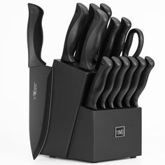 a black knife holder with eight knives in it