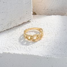 Make a bold statement with 14k real yellow gold Cuban Chain Statement Ring. This striking piece is perfect for those who seek for a conversation starter jewelry. Oval Link Chain Ring In Metal, Metal Oval Link Chain Ring, Minimalist Metal Chain Rings, Metal Chain Ring With Gold Link Chain, Gold Oval Link Chain Ring, Elegant Metal Chain Ring For Promises, Metal Chain Ring With Link Shape, Modern Gold Chain Ring For Formal Occasions, Yellow Gold Chain Metal Ring