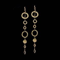 18k solid Gold Dangle Earrings, Delicate Mobile 18k Solid Gold Hammered Hoops on Chain earrings, fine jewelry Weight: 5.6g  (2.8g each earring)Length: 9.6cmWidth: 1.4cmAll earrings have 18k solid gold secured ear wire, post and nuts.Free Shipping! (Shipping insurance included)Would make a stunning set with these beautiful necklace:https://www.etsy.com/listing/62935709/18k-gold-necklace-gold-hoops-necklaceYou are welcome to visit my shop for more of my designs:https://www.etsy.com/shop/GoldArtJew Luxury Gold Sterling Silver Danglers, Formal Yellow Gold Plated Linear Earrings, Luxury Dangle Jewelry With Polished Finish, Luxury Dangle Linear Earrings For Pierced Ears, Tarnish Resistant Dangle Jewelry For Evening, Luxury 14k Gold Round Linear Earrings, Fine Jewelry 14k Gold Linear Earrings, Luxury Gold-plated Linear Earrings, 14k Gold Round Linear Earrings Fine Jewelry