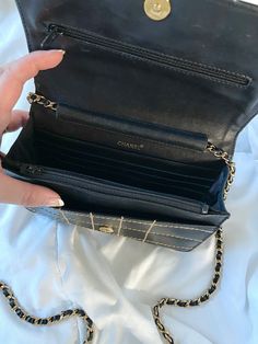 CONDITION SCALE:?ÿGOOD?ÿ . . ?ÿ A stunning?ÿChanel lambskin?ÿstitch wallet on chain. In a beautiful black and cream?ÿcolor combo making this the statement piece of any outfit. Excellent bag for the evening or on the run. Can fit phone, keys, wallet, and makeup.?ÿ Please review all pictures and ask questions prior to purchasing! To prevent any form of fraud, I?ÿkeep video records of?ÿmyself?ÿpackaging?ÿand dropping off each order, and?ÿall?ÿorders ship with?ÿtracking and?ÿsignature?ÿconfirmation. Please ensure your shipping address is correct as we are not responsible?ÿfor product?ÿonce shipped. Blue Wallet, Key Wallet, Girl Backpacks School, Chanel Wallet, Chanel Model, Bottega Veneta Shoulder Bag, Louis Vuitton Shoes, Rose Gold Hardware, Girl Backpacks