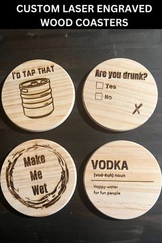 four coasters with different designs on them