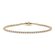 Turn heads with this stunning lab-grown diamond tennis bracelet. Set in warm 14-karat yellow gold  all the diamonds in this classic bracelet design are hand-matched for consistent color  clarity  and sparkle. A secure box clasp offers worry-free daily wear. Classic Yellow Gold Diamond Bracelet With Single Cut Diamonds, Classic Gold Bracelet With Round Cut Cubic Zirconia, Classic Gold Bracelet With Cubic Zirconia Round Cut, Formal Yellow Gold Diamond Bracelet With Prong Setting, Classic Gold Bracelet With Brilliant Cut, Classic Yellow Gold Diamond Bracelet With Prong Setting, Classic Yellow Gold Tennis Bracelet With Single Cut Diamonds, Yellow Gold Tennis Bracelet For Anniversary, Classic Diamond Gold Bracelet For Anniversary