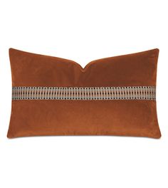 an orange pillow with silver stripes on the front and back, sitting against a white background