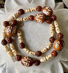 Beautiful Tibetian Carved Bone Skull Om Inlayed Sacred Wood Beads Ethnographic Vintage Necklace Necklace mesures 24 1/2 inches around Well Done, high vibe Bohemian Bone Colored Jewelry For Festivals, Bohemian Bone-colored Jewelry For Festival, Bohemian 108 Beads For Rituals, Bohemian Bone-colored Necklace For Festivals, Hand-strung Bohemian Mala For Festivals, Bohemian Hand-strung Mala For Festivals, Handmade Bohemian Bone Beaded Necklaces, Bohemian Beaded Necklaces With 8mm Beads For Festivals, Brown Beaded Mala For Festivals