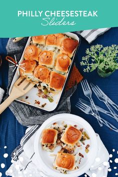 a white plate topped with sliders next to a bowl of dip and silverware